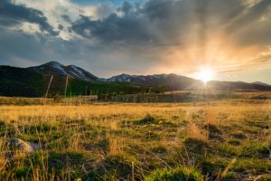 Sun rising over mountains in Wasatch National Forest